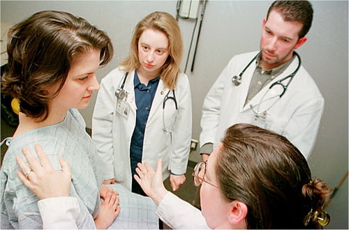 Woman Getting Physical Exam Photo - Cosmetic Surgery Center