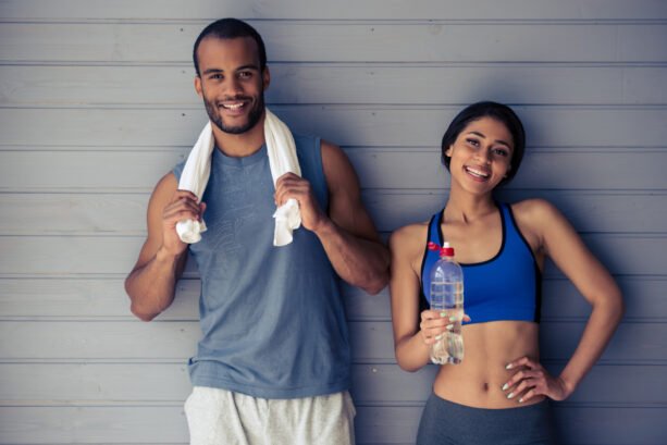 Happy Fit Couple Together in Workout Clothes