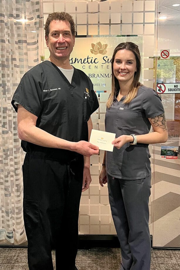 Cosmetic surgeon Dr. Rhys Branman and Miranda Drake, the 2023 Arkansas Rural Health Scholarship recipient